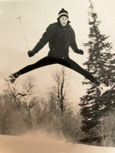 Butch Hoffman jumps off School Hill at Snowbasin