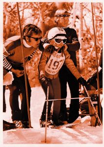 Butch Hoffman coaches daughter Heidi while son Scott looks on