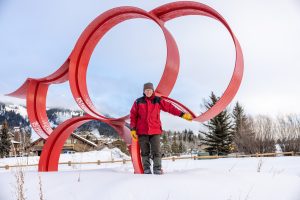 John Simms with Red Artwork